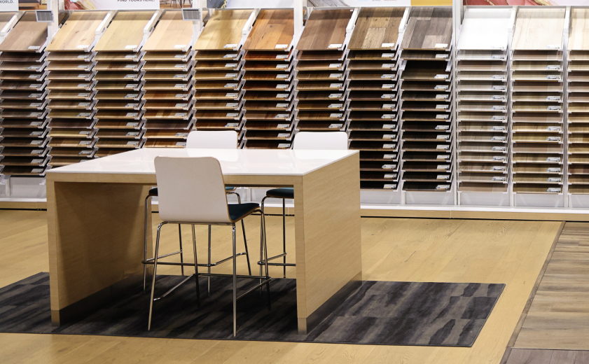 Showroom display with flooring samples and desk 